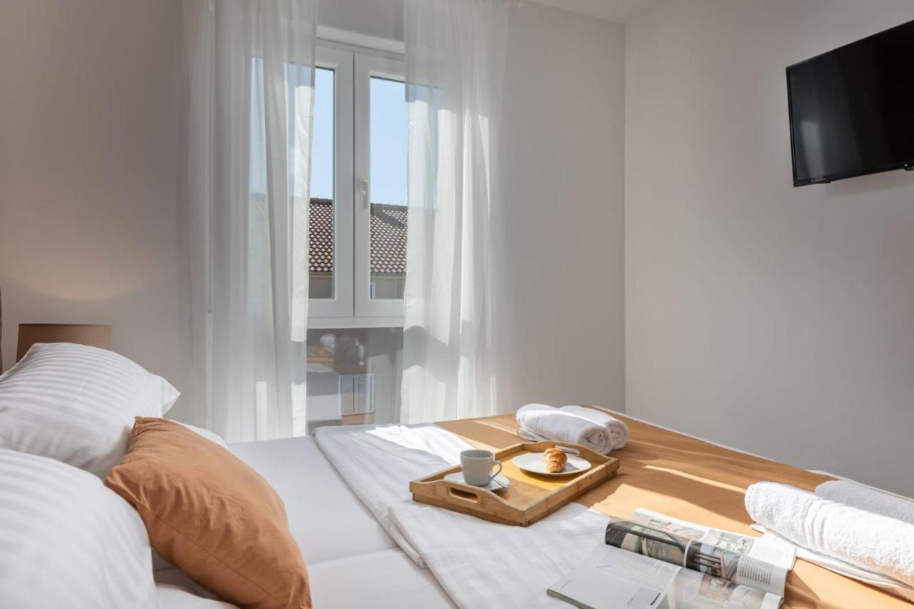 Apartments Cesare Nin Buitenkant foto